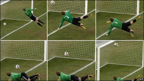a goalkeeper trying to catch the football